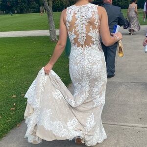 Stella York White/Cream Lace Wedding Dress
I am 5’5, 130lbs, size 6